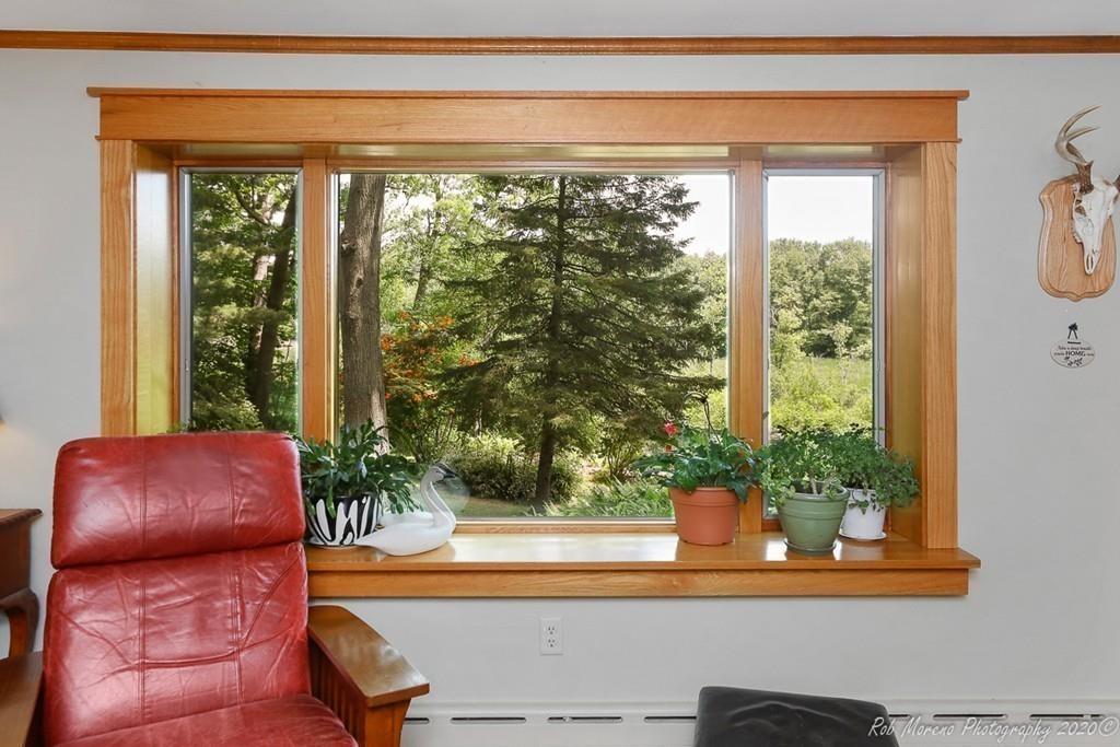 6 Pilgrim Road Hamilton, MA 01982 - Photo 8 of 32 a outdoor living room with furniture and a potted plant