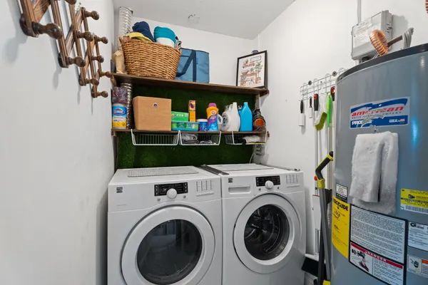 a utility room with dryer and washer