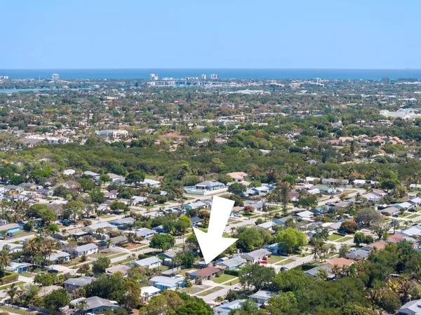 an aerial view of a city with lots of residential buildings