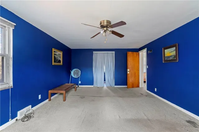 a workspace with furniture and window