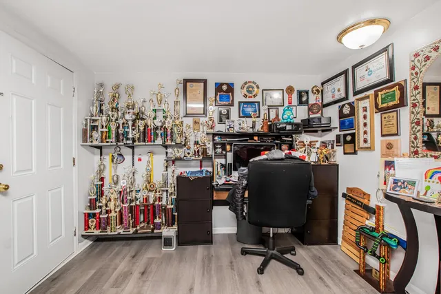 a bed room with furniture and decor