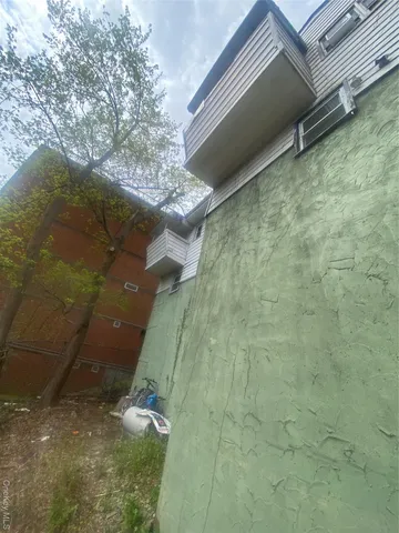 a car parked in front of a house