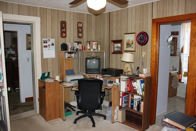 17530 Millard Road Morrison, IL 61270 - Photo 9 of 17 a view of a workspace with furniture and a gate