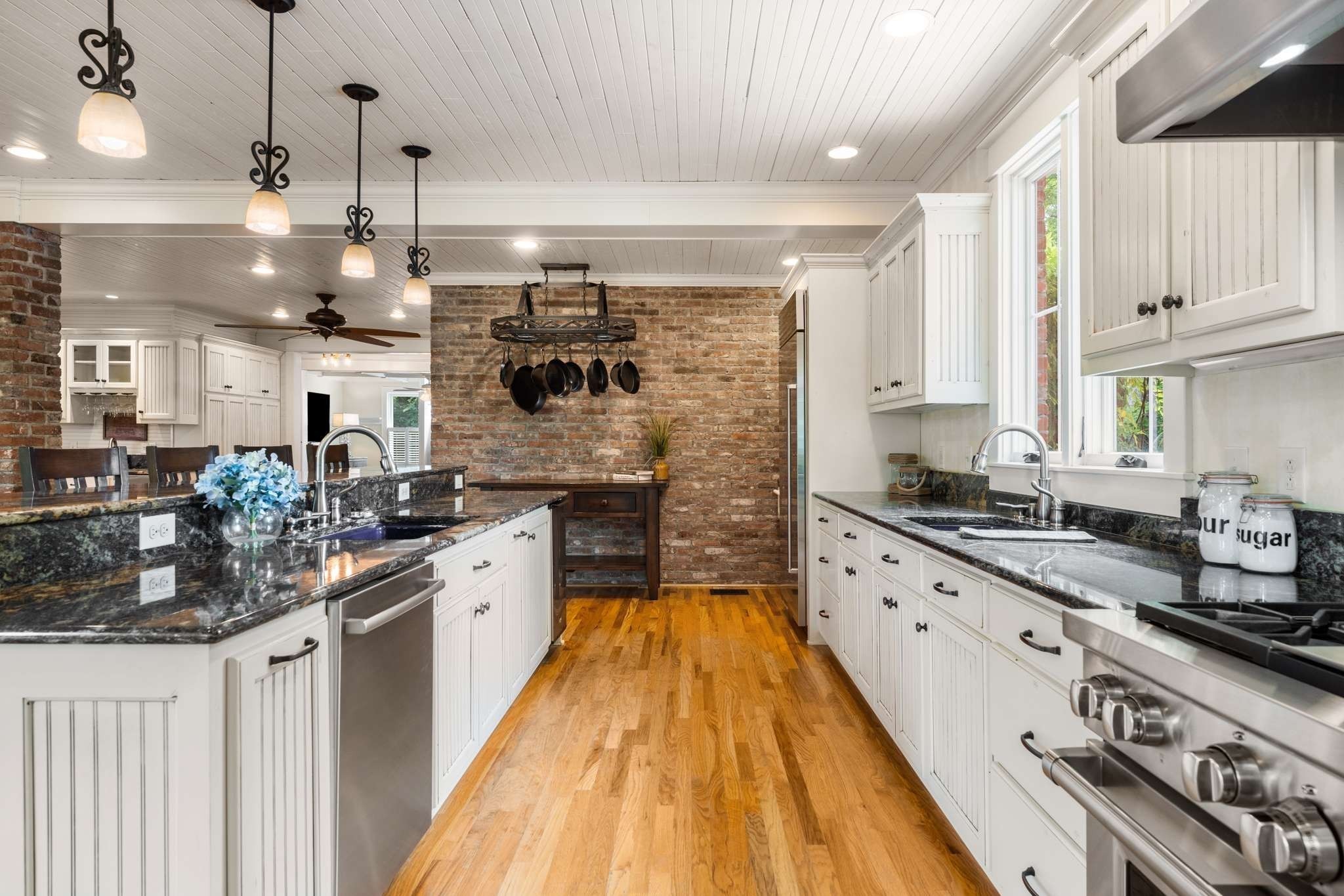405 Webb Road West Bell Buckle, TN 37020 - Photo 16 of 70 a large kitchen with stainless steel appliances granite countertop a lot of counter space and a sink