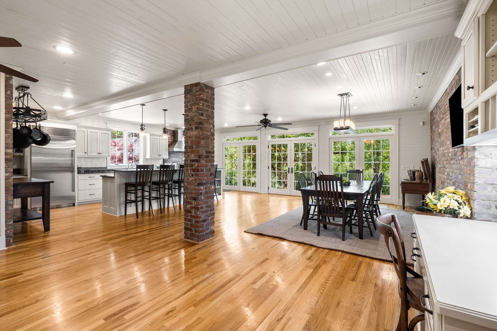 405 Webb Road West Bell Buckle, TN 37020 - Photo 21 of 70 a view of a dining room with furniture and wooden floor