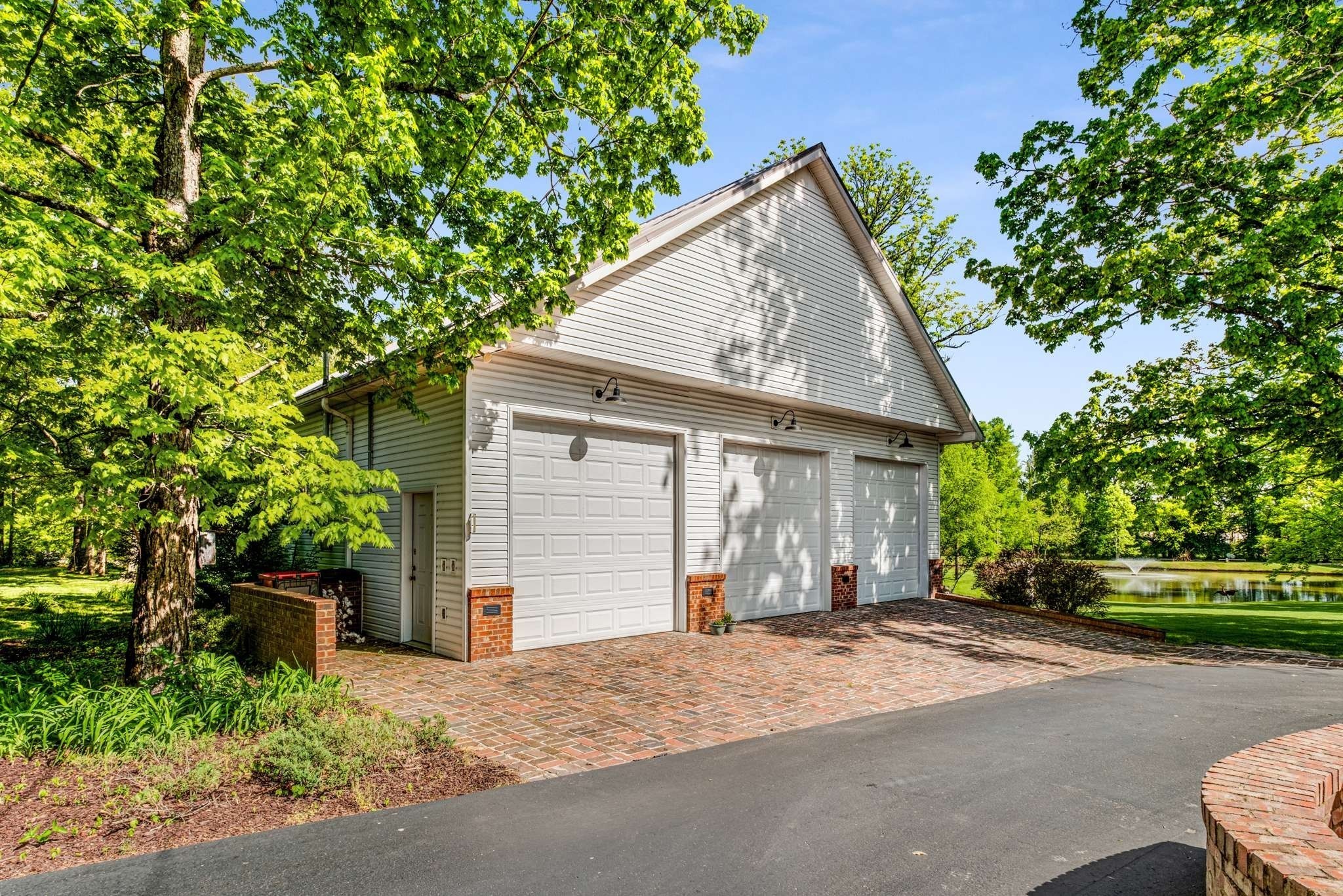 405 Webb Road West Bell Buckle, TN 37020 - Photo 52 of 70 a view of a house with a yard