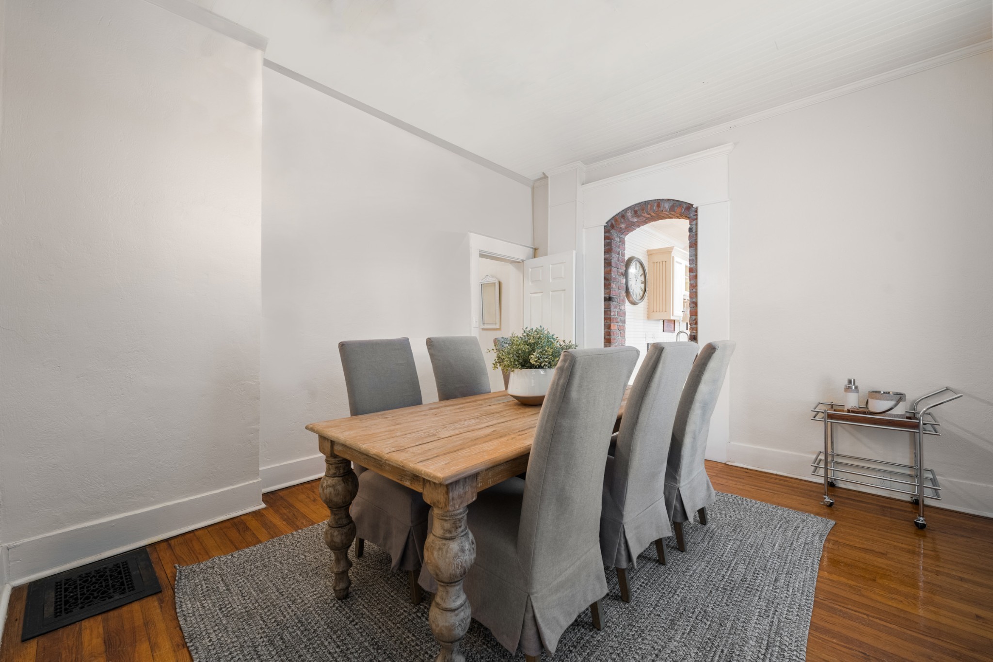 405 Webb Road West Bell Buckle, TN 37020 - Photo 10 of 70 a view of a dining room with furniture and wooden floor