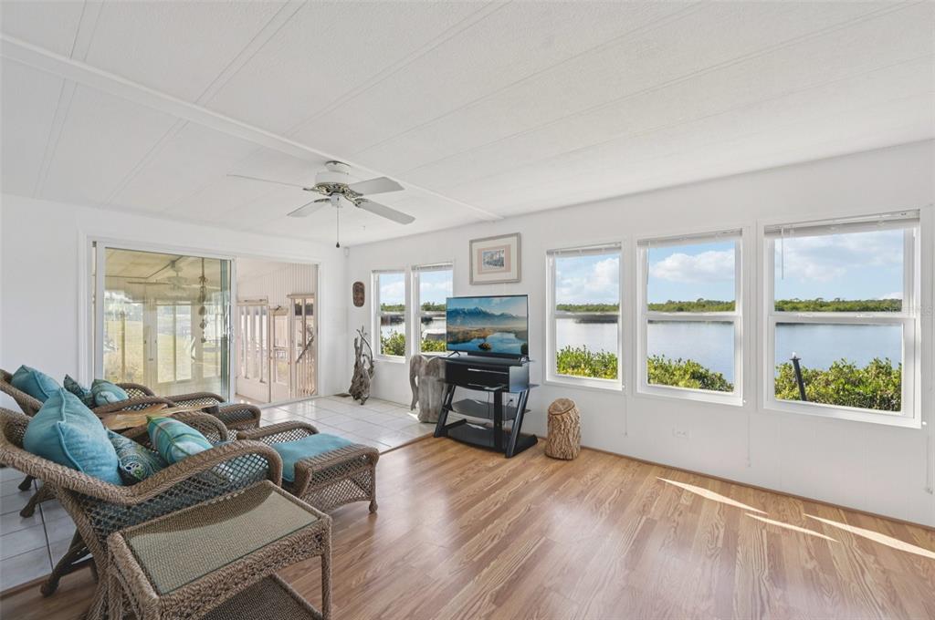 156 Martinique Road North Port, FL 34287 - Photo 13 of 46 a living room with furniture and a large window