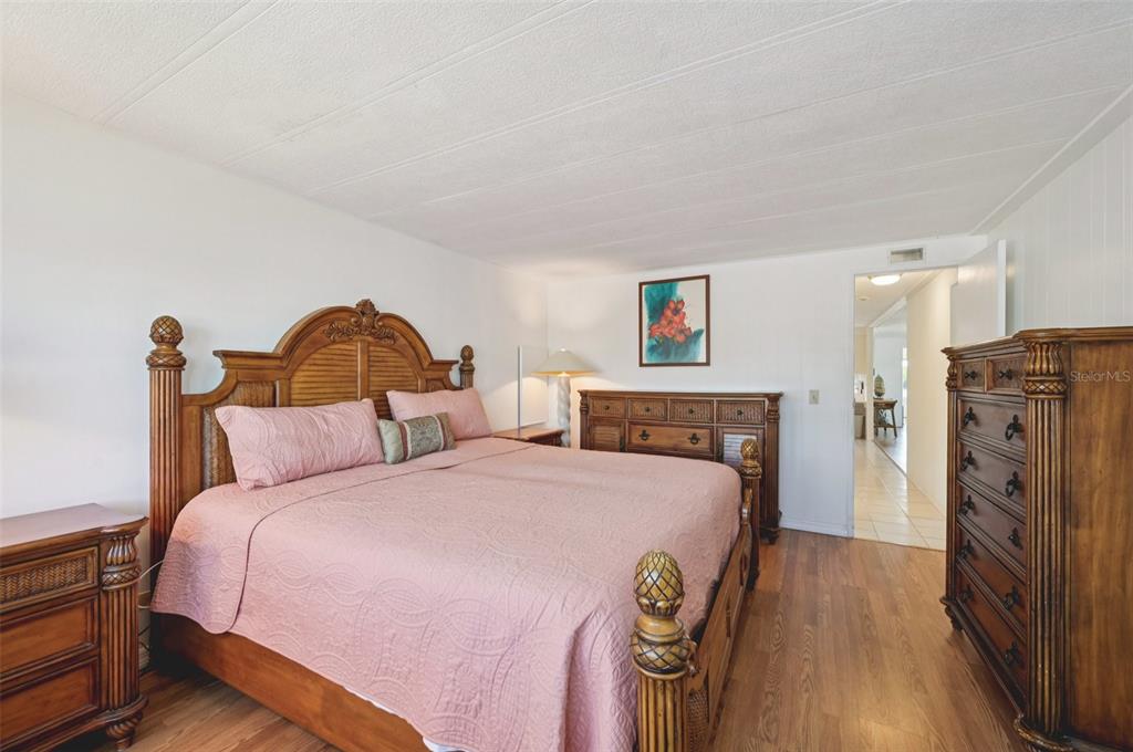 156 Martinique Road North Port, FL 34287 - Photo 17 of 46 a bed room with a bed and a television