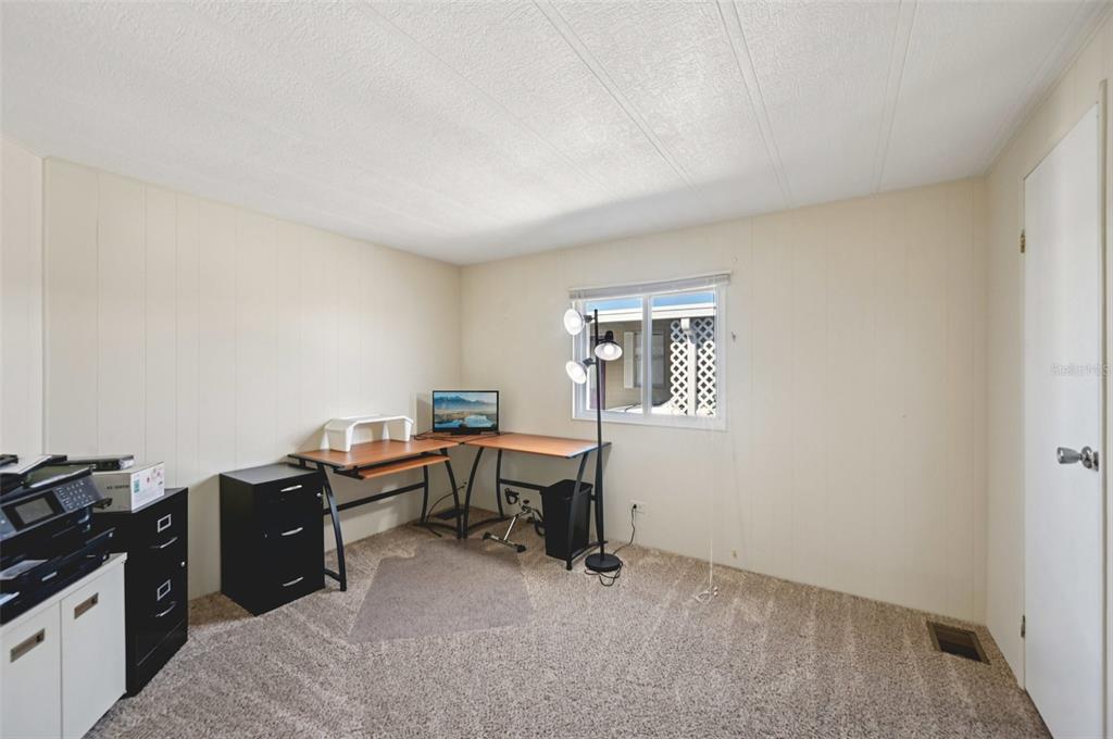 156 Martinique Road North Port, FL 34287 - Photo 21 of 46 a view of a workspace with furniture