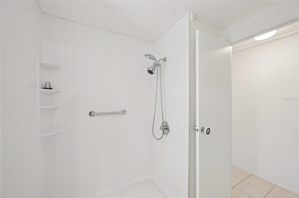 156 Martinique Road North Port, FL 34287 - Photo 23 of 46 a bathroom with a shower