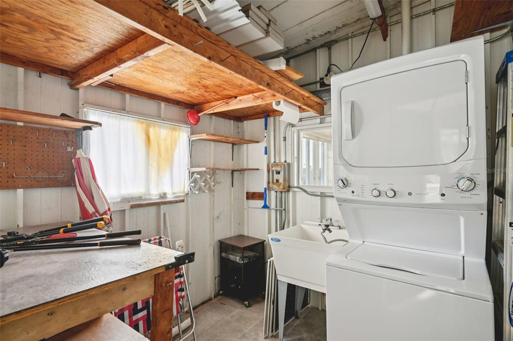 156 Martinique Road North Port, FL 34287 - Photo 25 of 46 a room with storage and utility