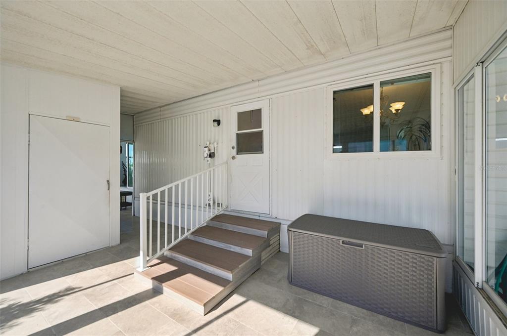 156 Martinique Road North Port, FL 34287 - Photo 31 of 46 a living room with a couch and a rug