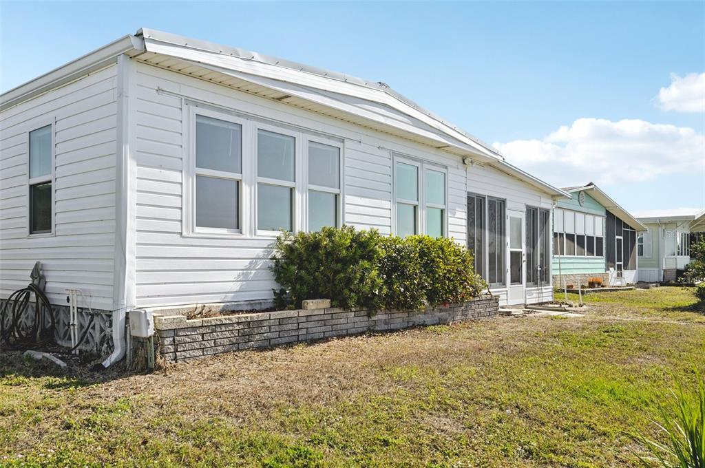 156 Martinique Road North Port, FL 34287 - Photo 36 of 46 a view of a house with a yard