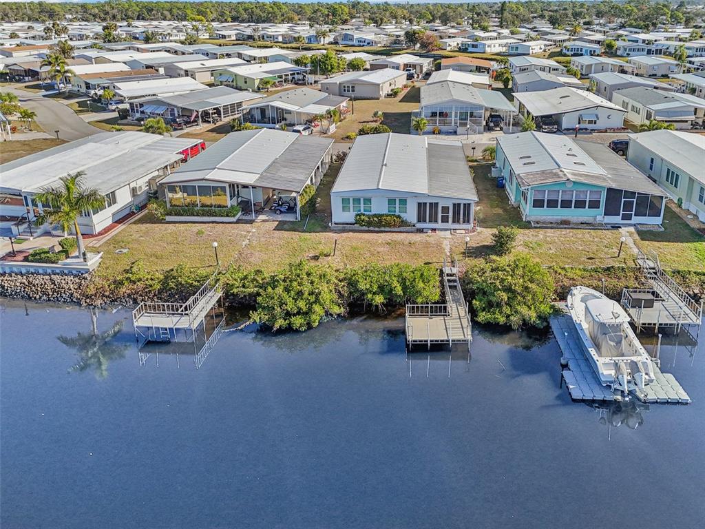 156 Martinique Road North Port, FL 34287 - Photo 41 of 46 an aerial view of a houses with outdoor space