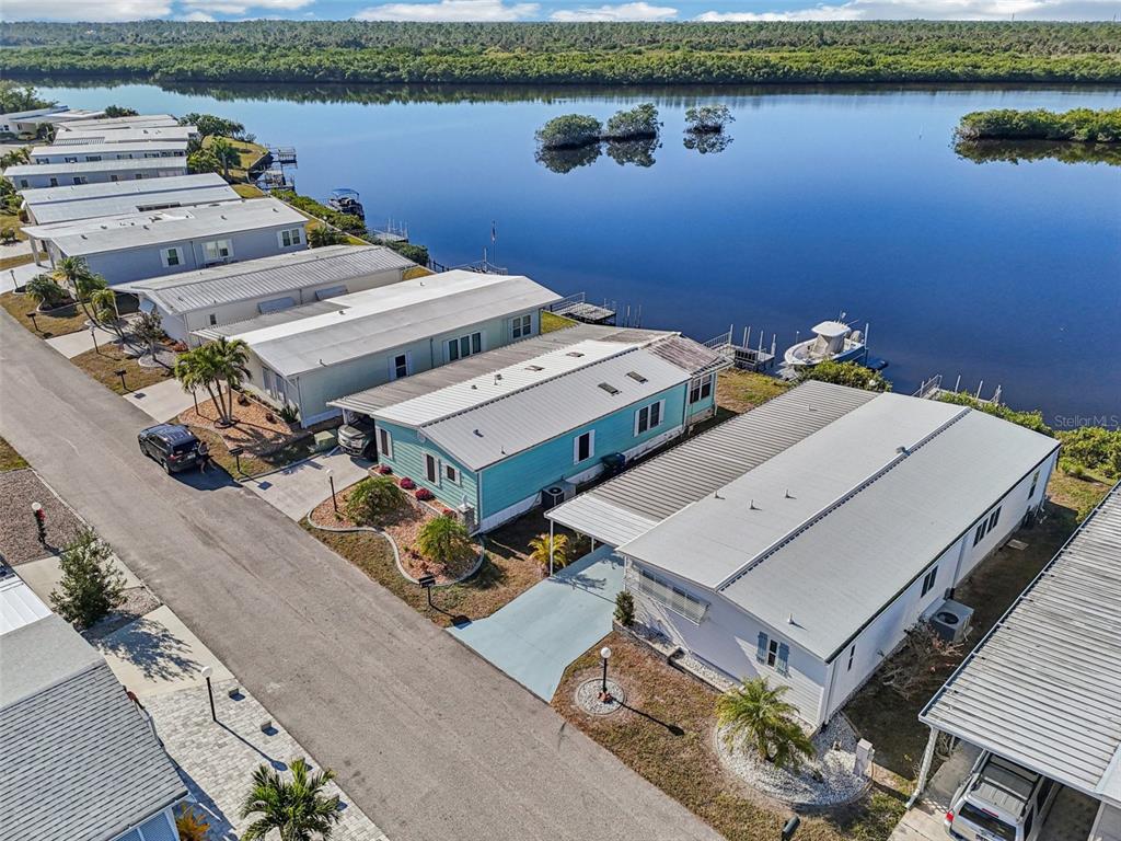 156 Martinique Road North Port, FL 34287 - Photo 45 of 46 an aerial view of a house with a lake view