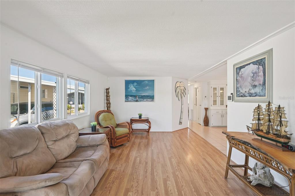 156 Martinique Road North Port, FL 34287 - Photo 10 of 46 a living room with furniture and wooden floor