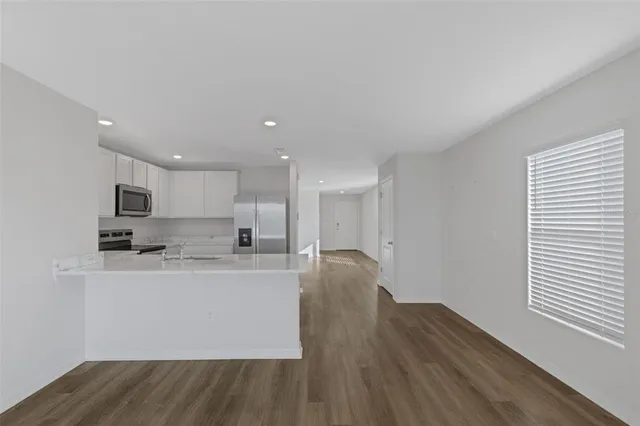 an empty room with windows