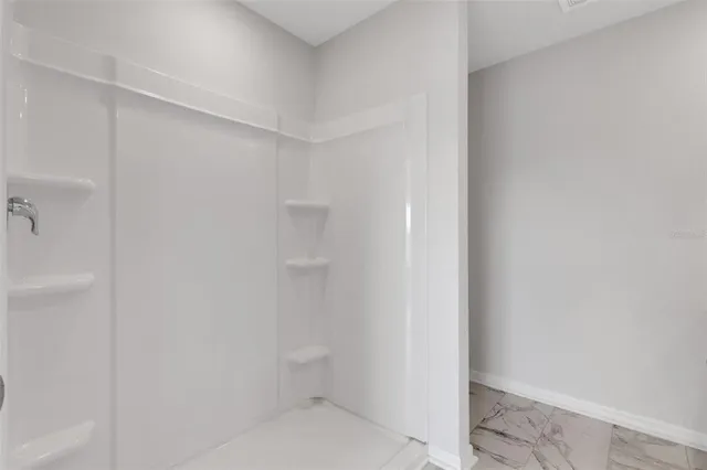 a bathroom with a sink toilet and a bathtub