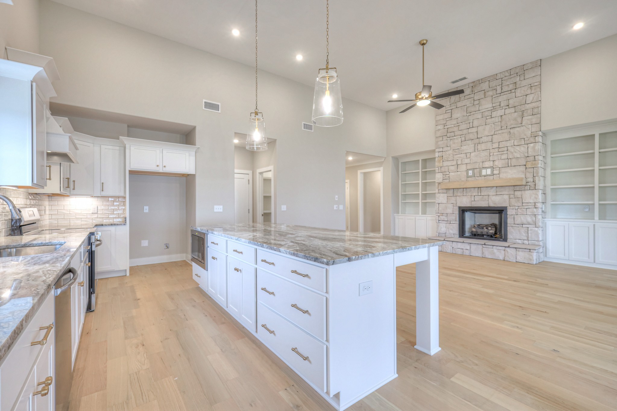 5536 Sinclair Street Murfreesboro, TN 37127 - Photo 13 of 46 a large kitchen with kitchen island a sink stainless steel appliances and cabinets
