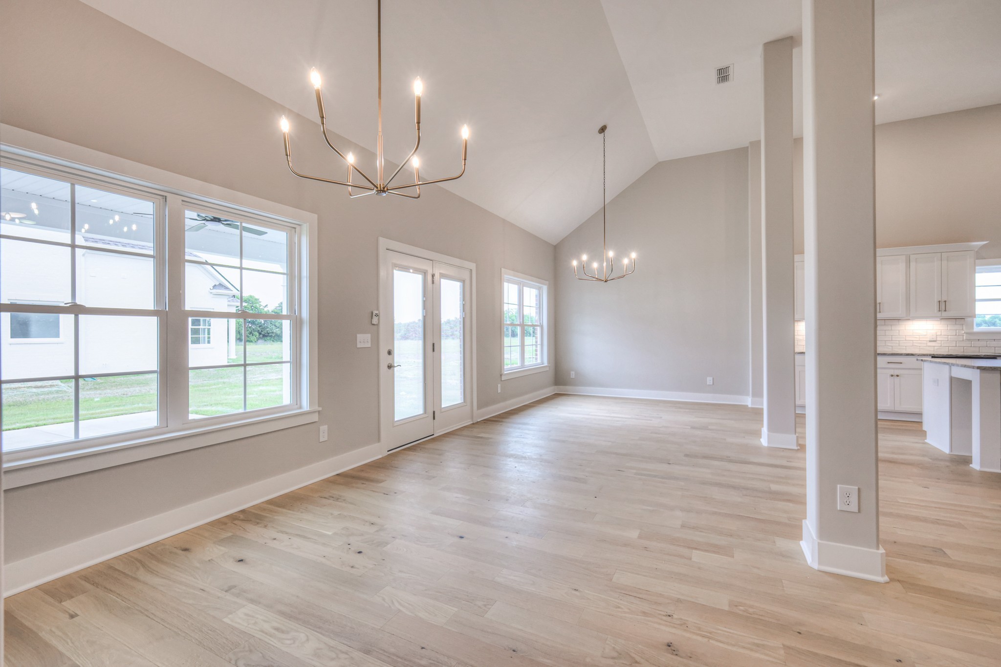 5536 Sinclair Street Murfreesboro, TN 37127 - Photo 16 of 46 a view of an empty room with wooden floor and a window