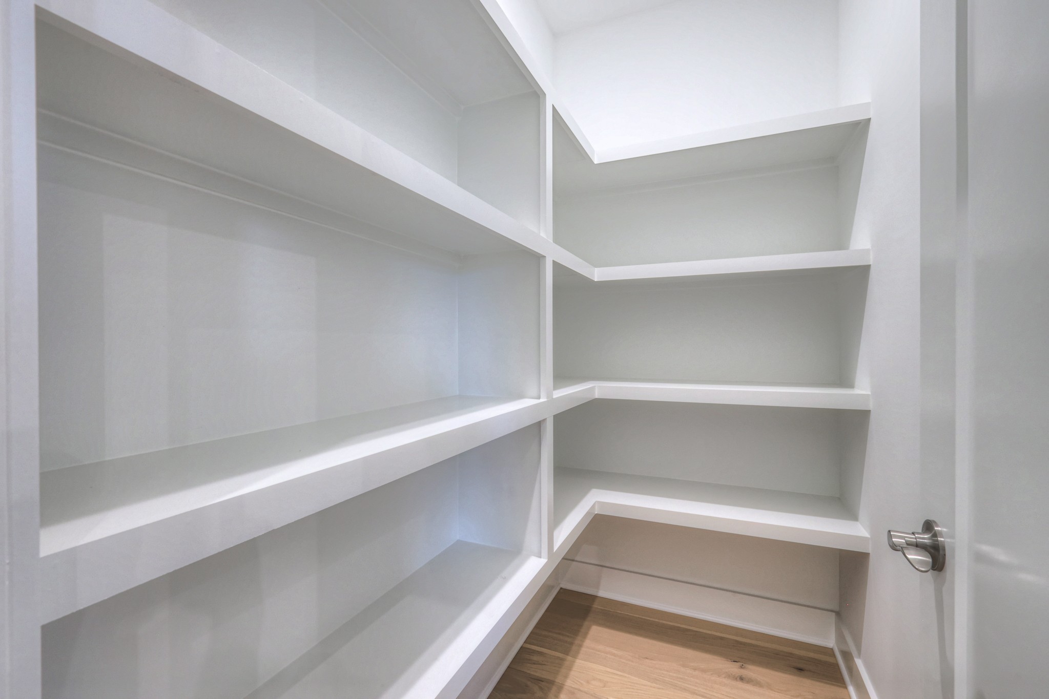 5536 Sinclair Street Murfreesboro, TN 37127 - Photo 18 of 46 a storage room with empty racks