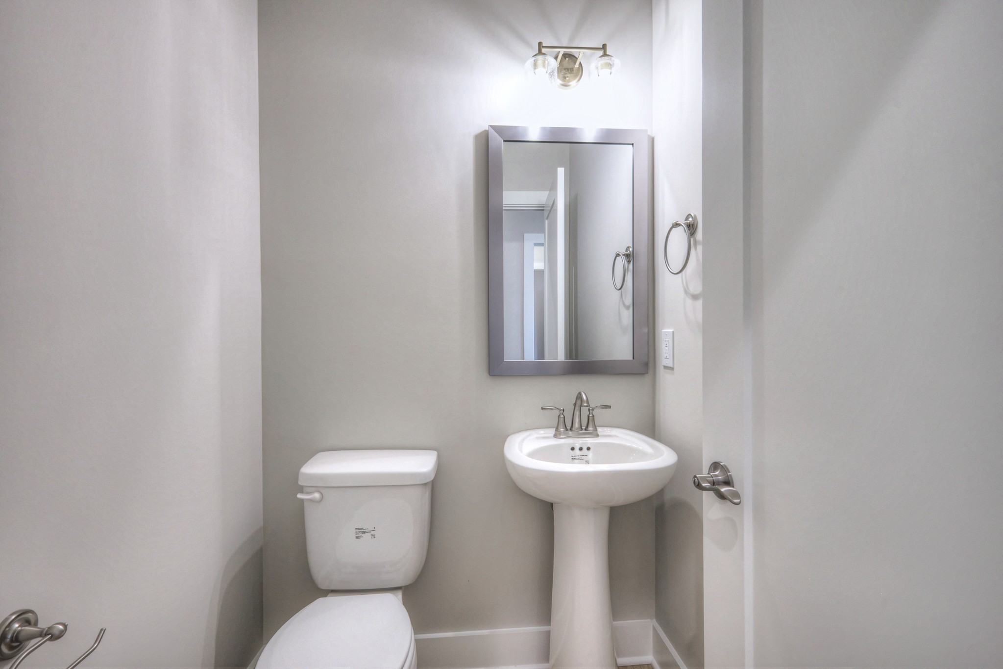 5536 Sinclair Street Murfreesboro, TN 37127 - Photo 19 of 46 a bathroom with a toilet sink and mirror