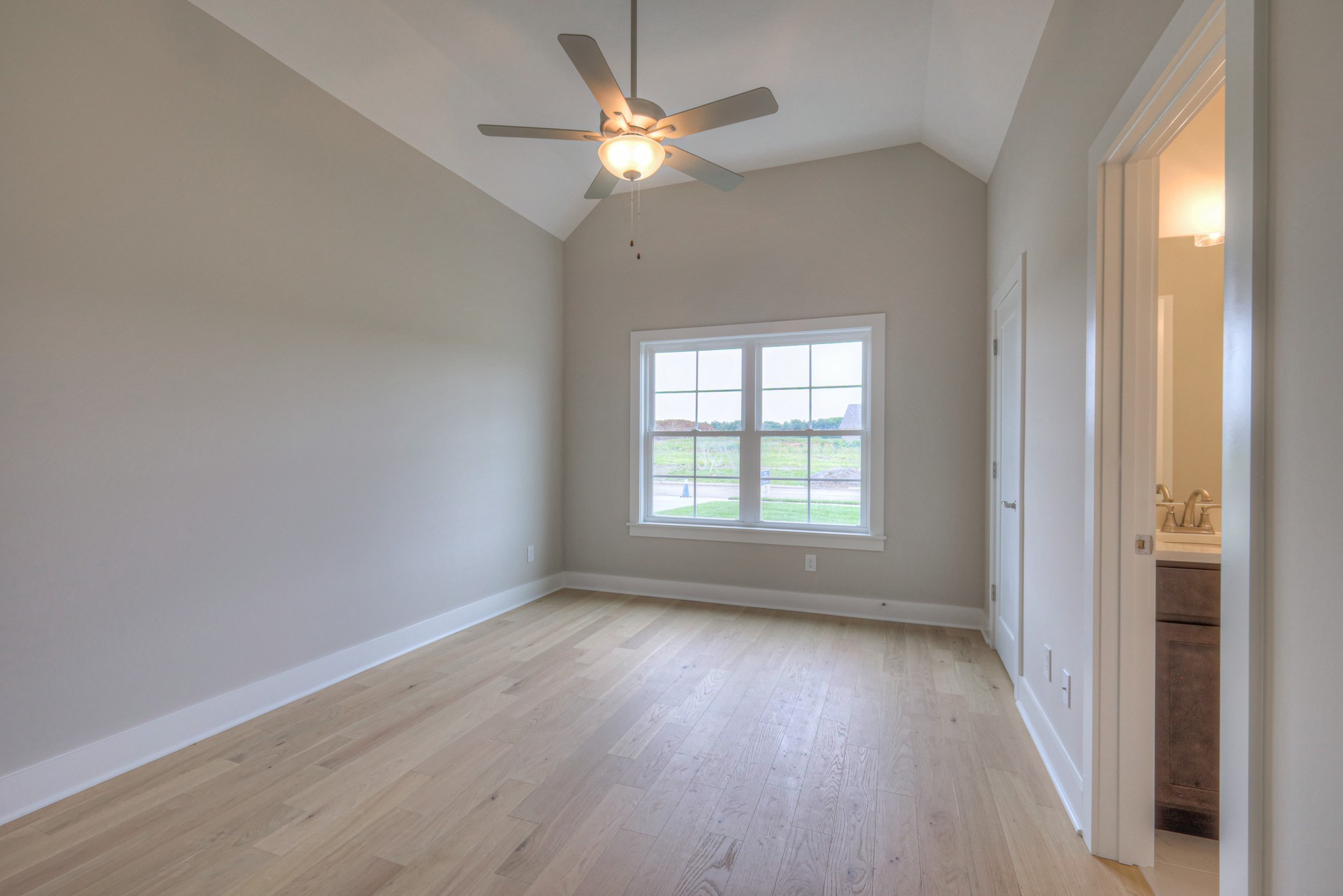 5536 Sinclair Street Murfreesboro, TN 37127 - Photo 22 of 46 an empty room with wooden floor fan and windows