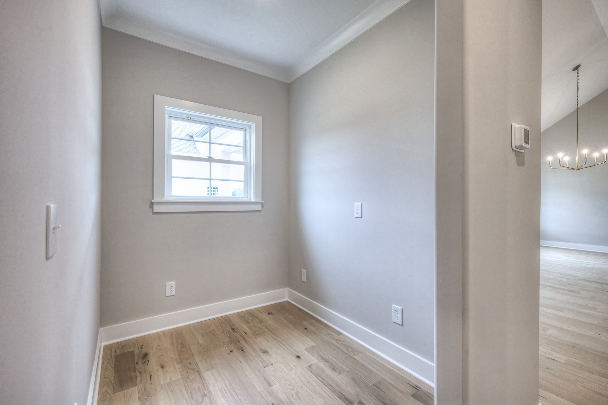 5536 Sinclair Street Murfreesboro, TN 37127 - Photo 26 of 46 an empty room with wooden floor and windows