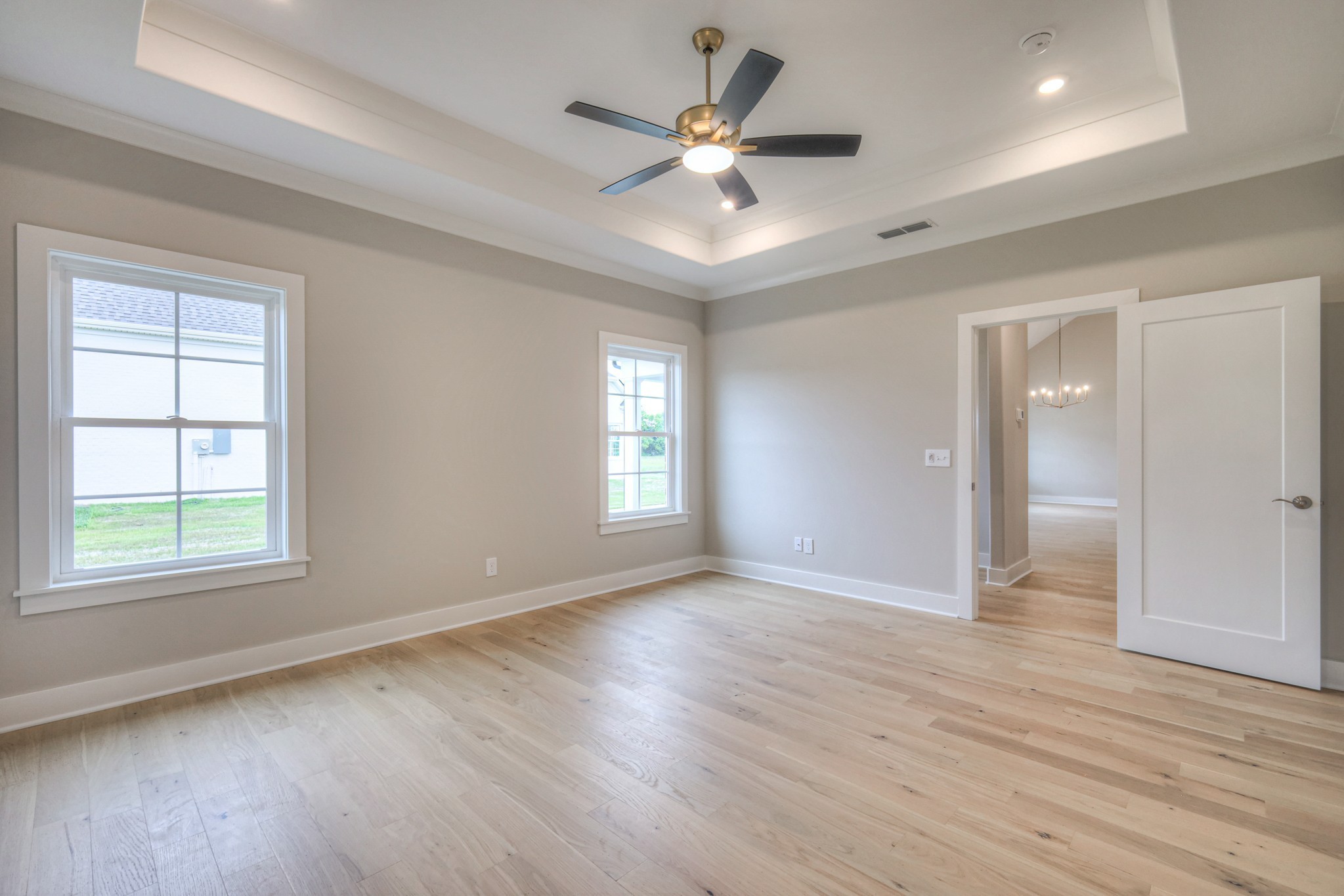 5536 Sinclair Street Murfreesboro, TN 37127 - Photo 30 of 46 a view of an empty room with wooden floor and a window