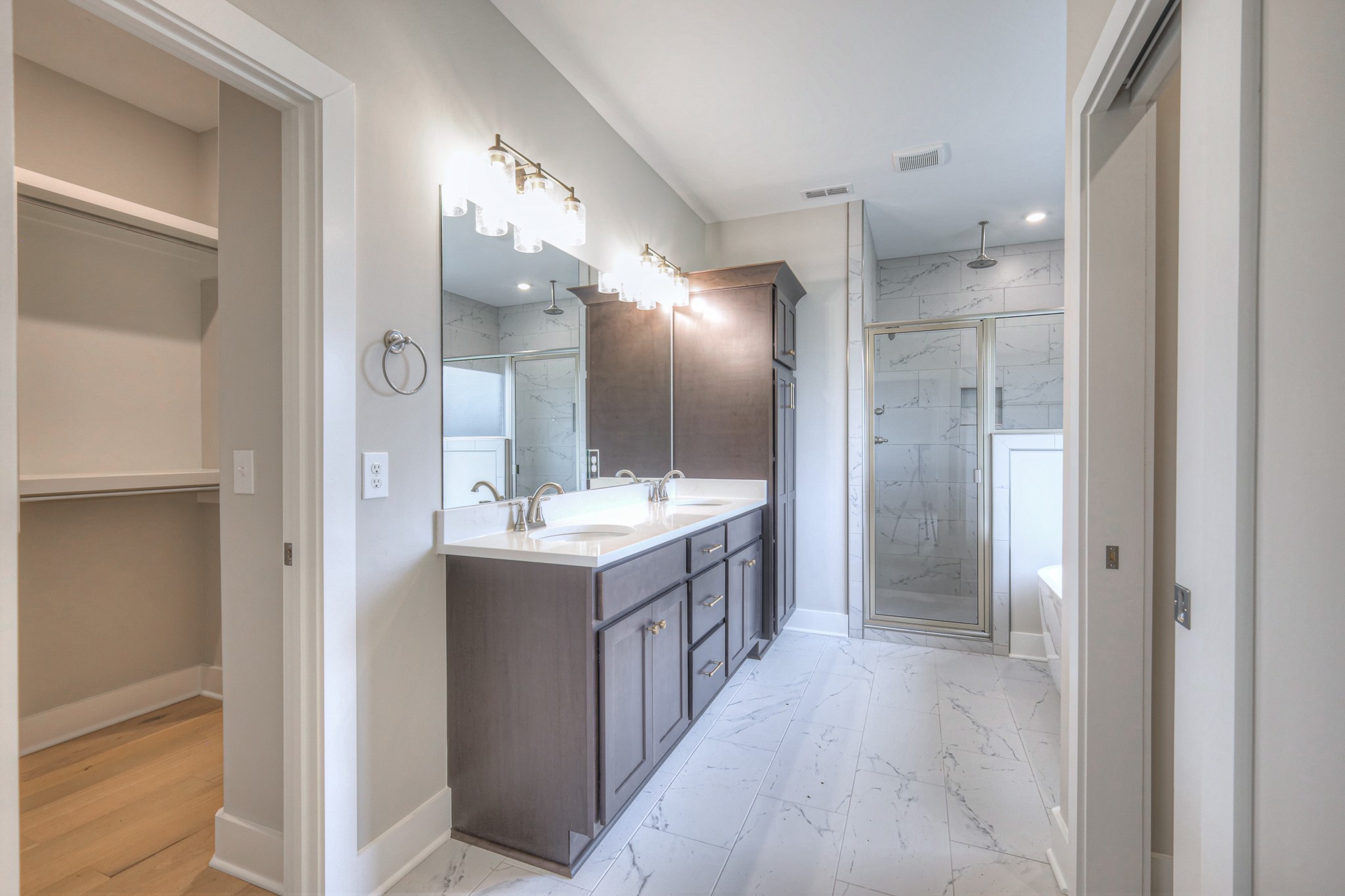 5536 Sinclair Street Murfreesboro, TN 37127 - Photo 31 of 46 a bathroom with a double vanity sink and a mirror
