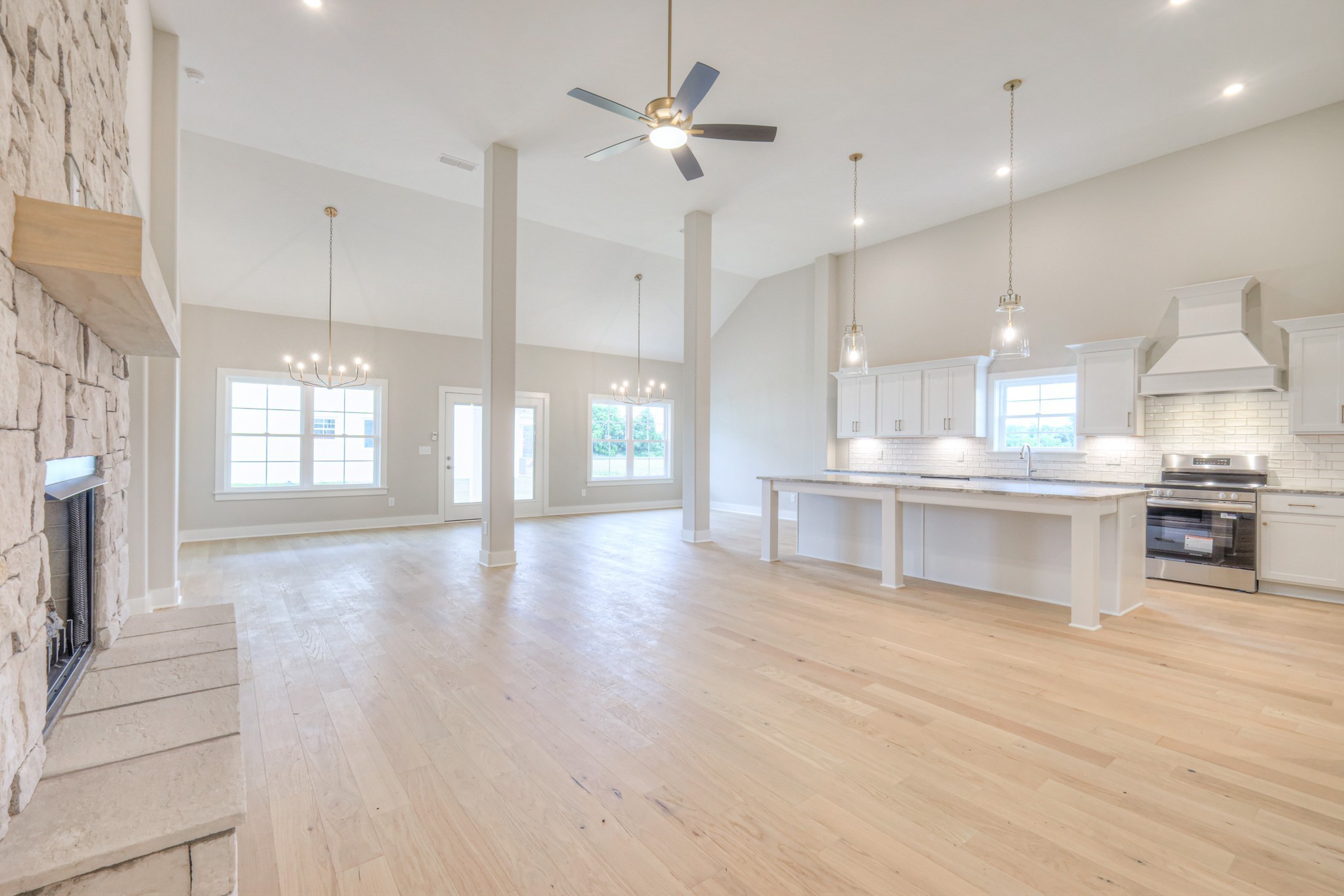 5536 Sinclair Street Murfreesboro, TN 37127 - Photo 4 of 46 a view of kitchen with refrigerator stove and wooden floor