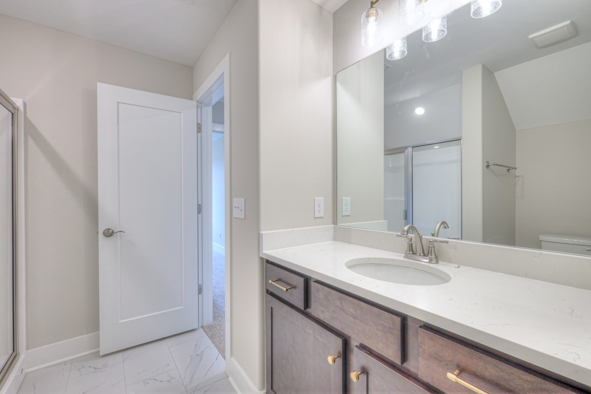 5536 Sinclair Street Murfreesboro, TN 37127 - Photo 43 of 46 a bathroom with a sink double vanity and a mirror