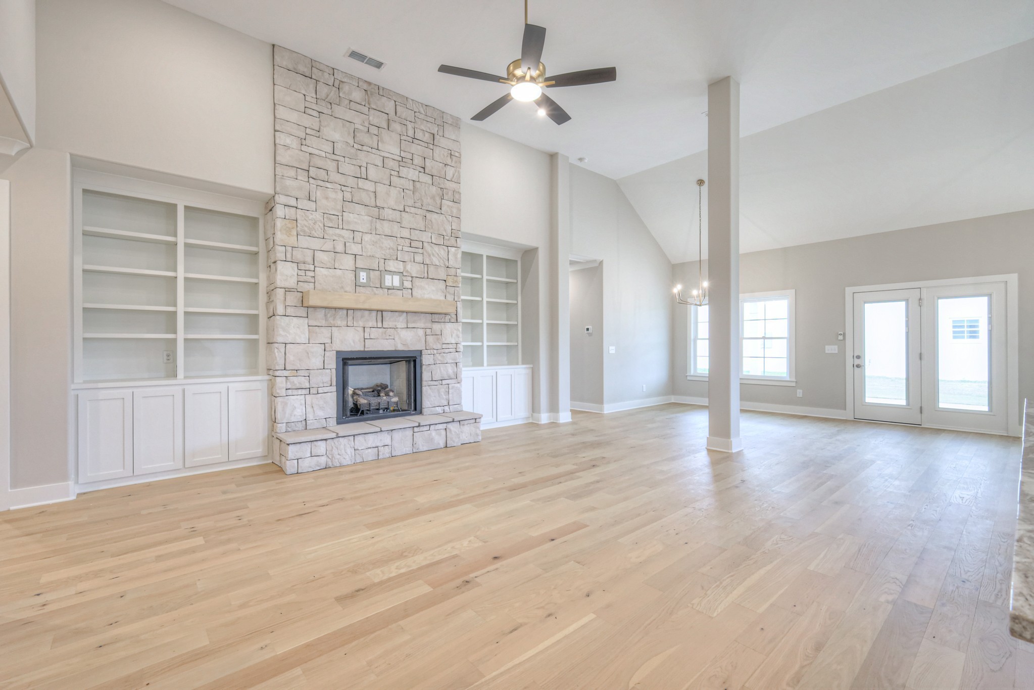 5536 Sinclair Street Murfreesboro, TN 37127 - Photo 5 of 46 a view of an empty room with a fireplace and a window