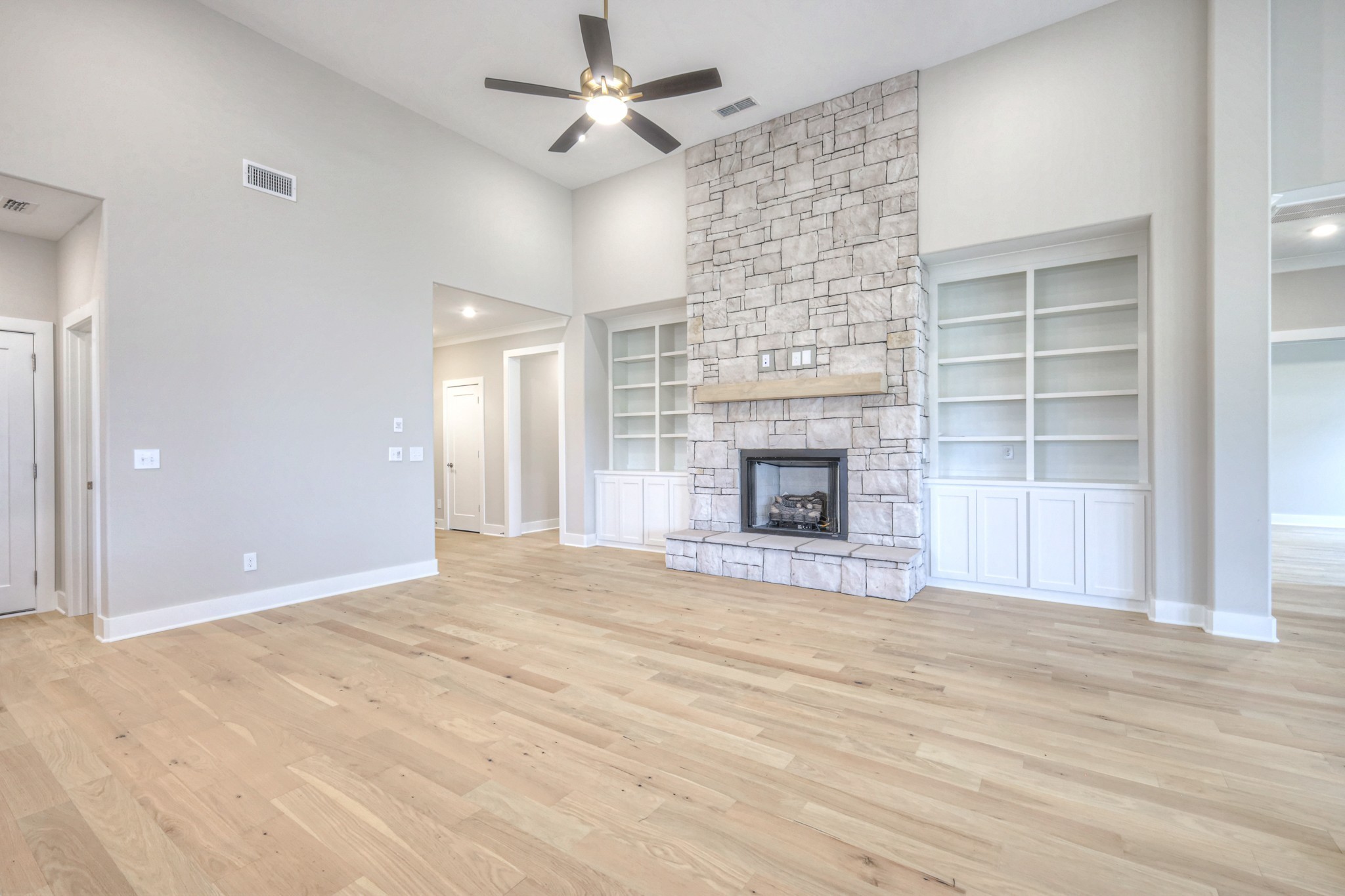 5536 Sinclair Street Murfreesboro, TN 37127 - Photo 6 of 46 a view of an empty room with a fireplace and a window