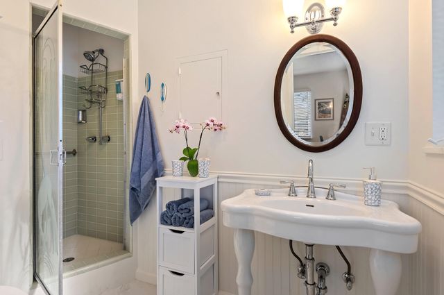 a bathroom with a sink and a mirror
