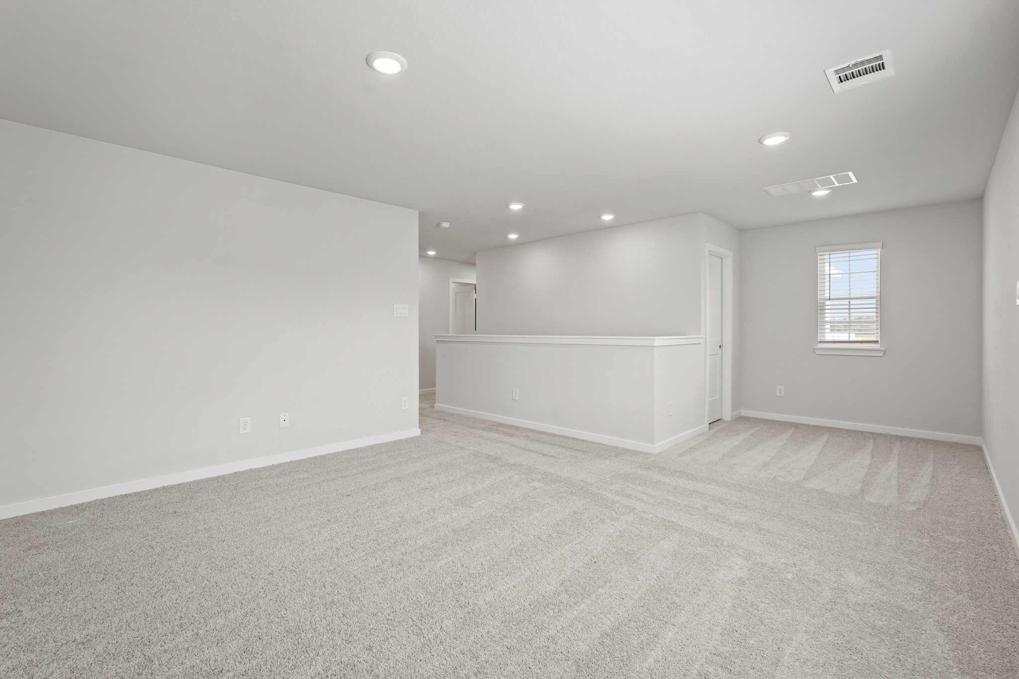 217 Spring Drive Hockley, TX 77447 - Photo 16 of 27 a view of an empty room with a window