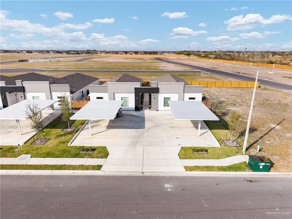 a view of a swimming pool with an outdoor seating