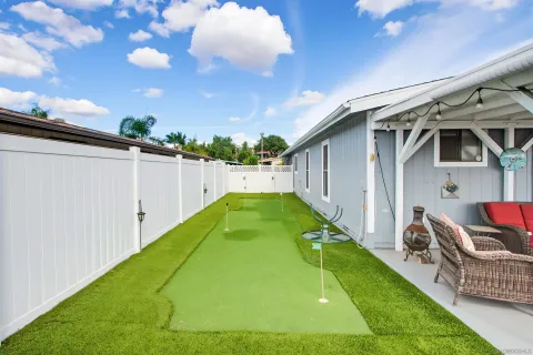 a view of a room with wooden floor and wall