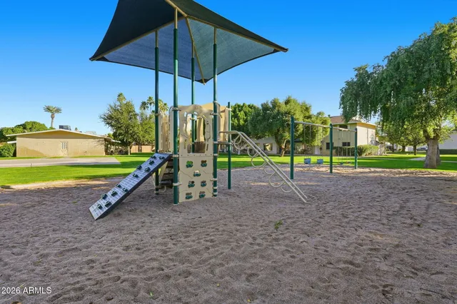 a view of a park with slide