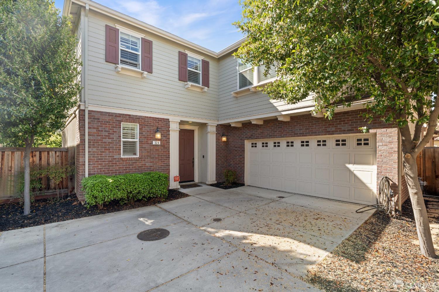 324 MacArthur Way Brentwood, CA 94513 - Photo 1 of 45 a view of a house with a tree
