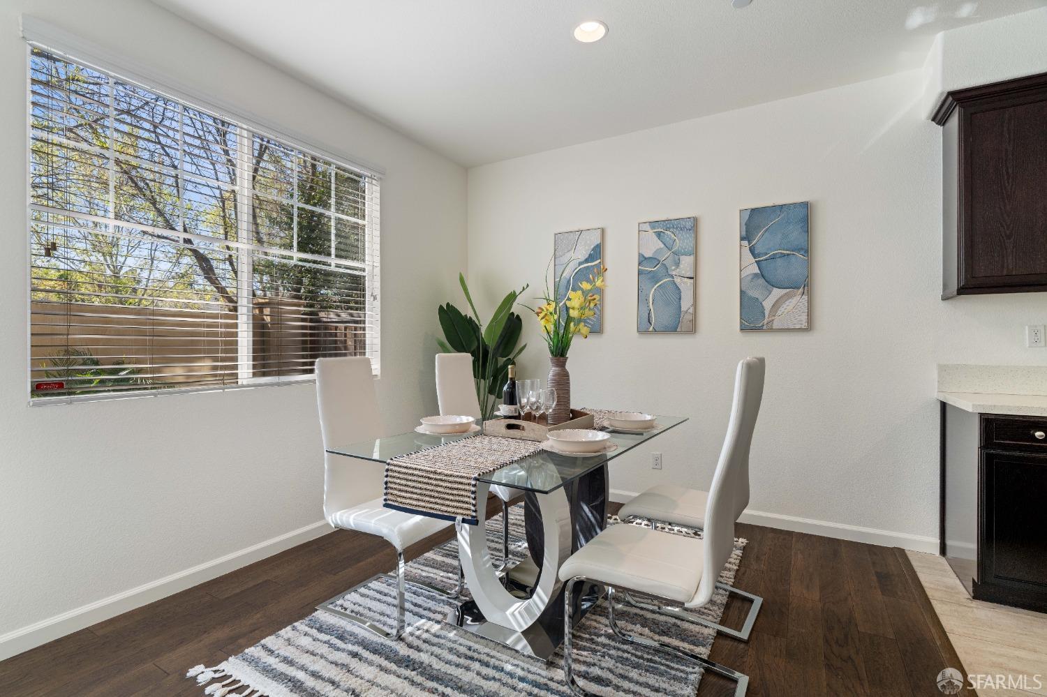 324 MacArthur Way Brentwood, CA 94513 - Photo 13 of 45 a view of a dining room with furniture window and wooden floor