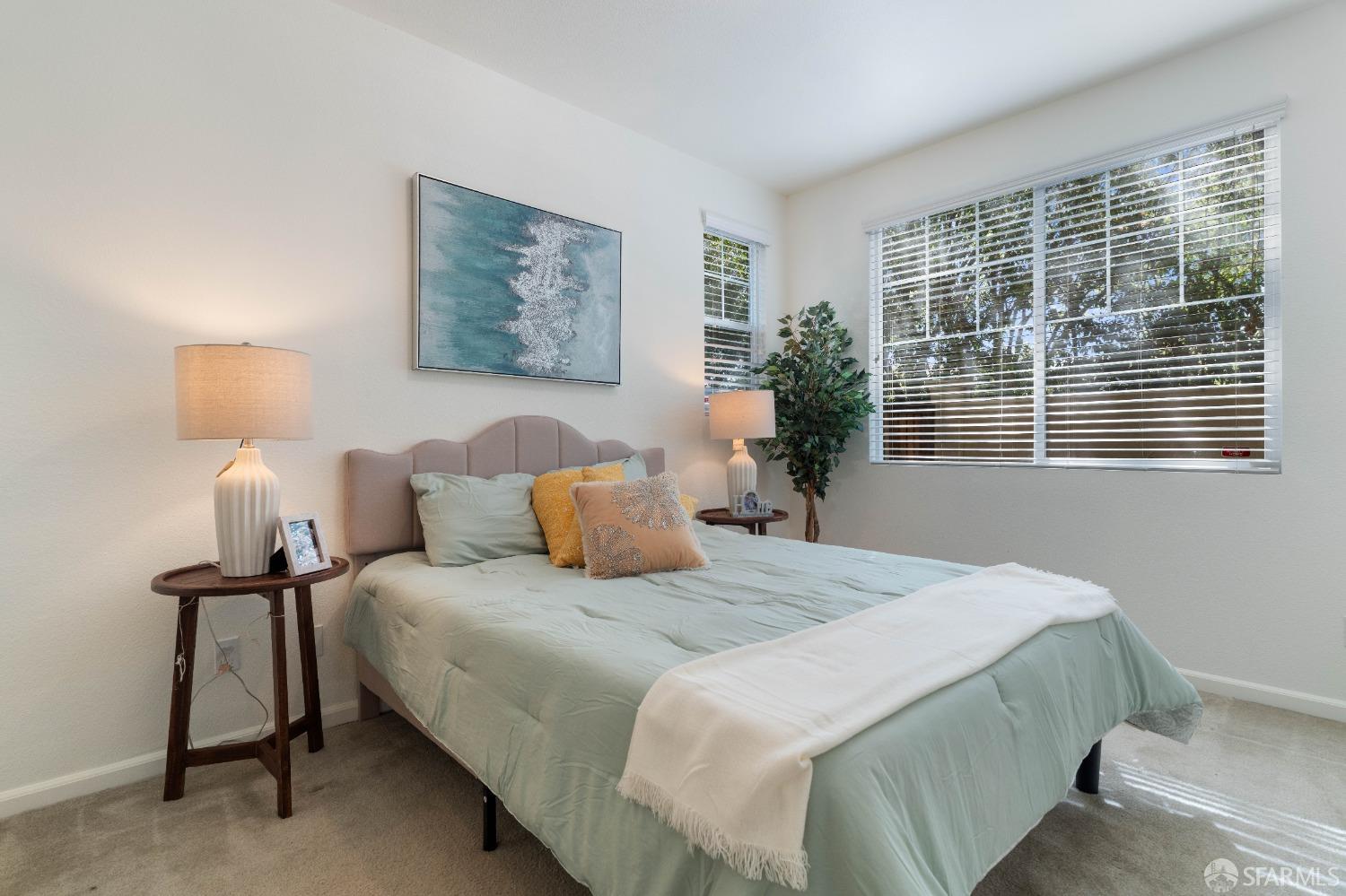 324 MacArthur Way Brentwood, CA 94513 - Photo 16 of 45 a bedroom with a bed and a night stand