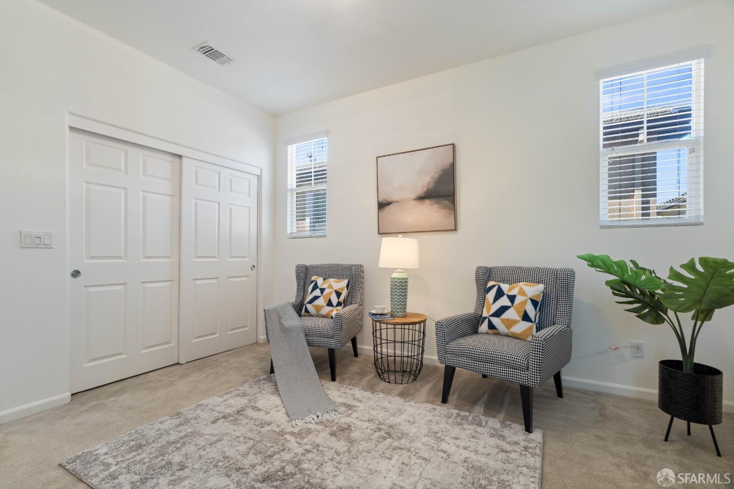 324 MacArthur Way Brentwood, CA 94513 - Photo 21 of 45 a living room with furniture and a potted plant