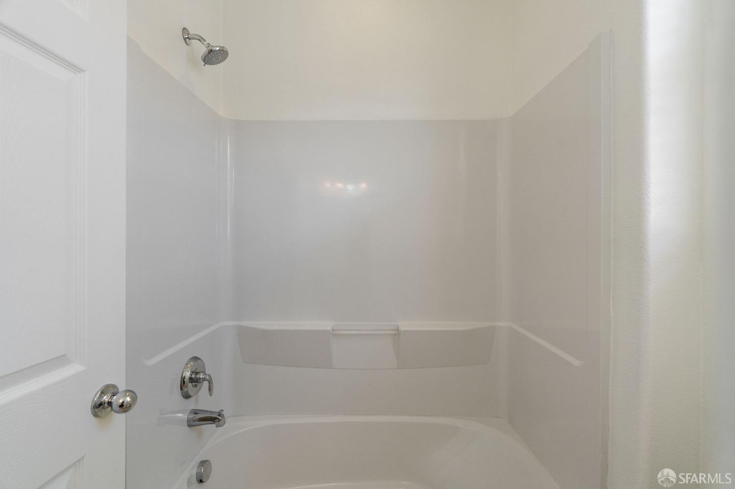 324 MacArthur Way Brentwood, CA 94513 - Photo 25 of 45 a bathroom with a bathtub