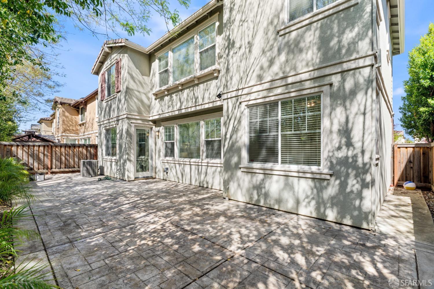 324 MacArthur Way Brentwood, CA 94513 - Photo 36 of 45 a large brick building with a large windows