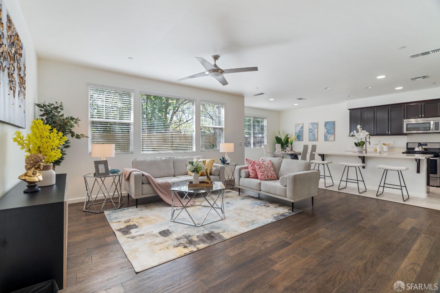 324 MacArthur Way Brentwood, CA 94513 - Photo 4 of 45 a living room with furniture or kitchen and a wooden floor