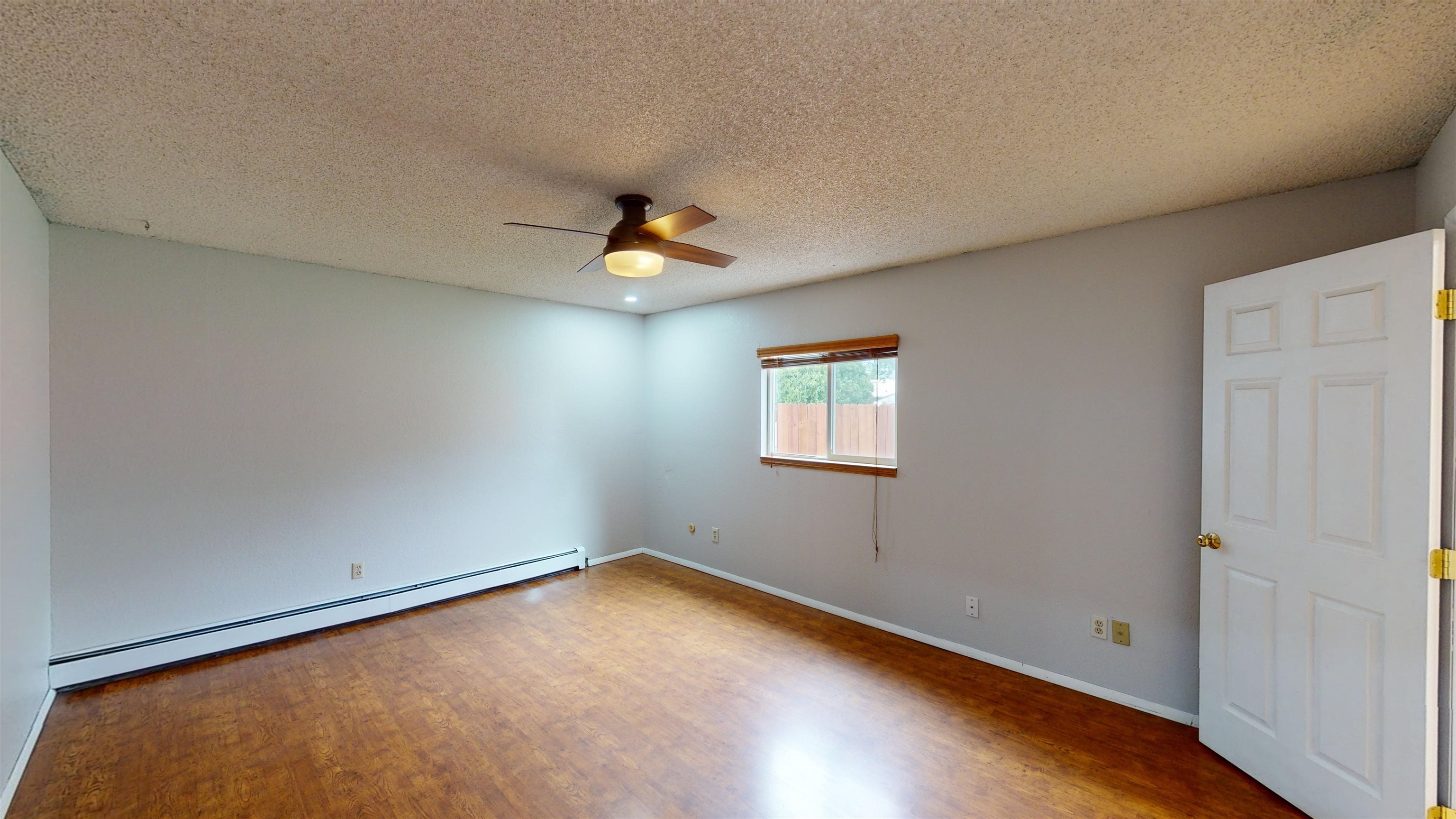 449 Doris Road Grand Junction, CO 81504 - Photo 13 of 35 a view of a room with wooden floor and window