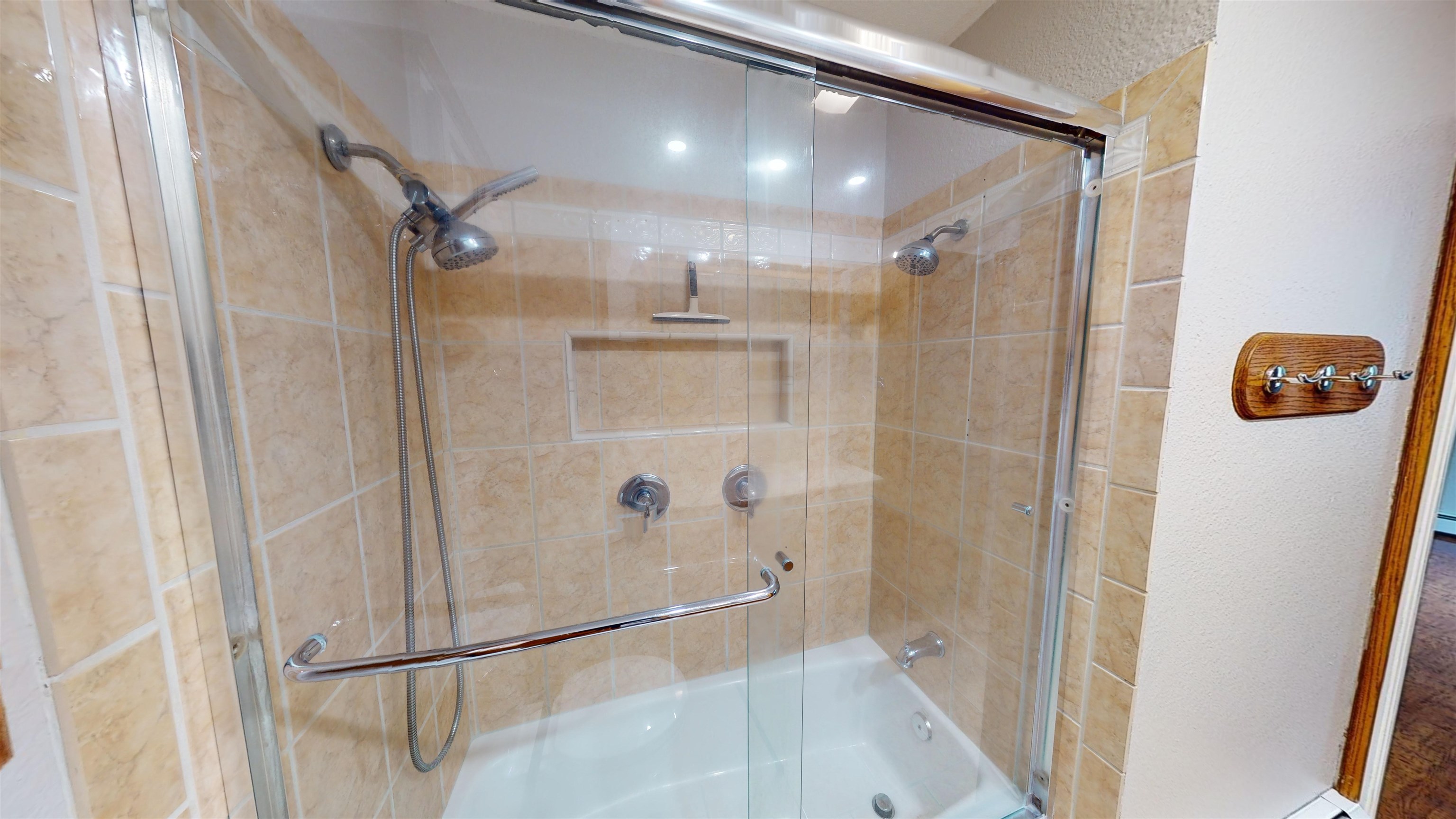 449 Doris Road Grand Junction, CO 81504 - Photo 19 of 35 a bathroom with a shower and a glass door