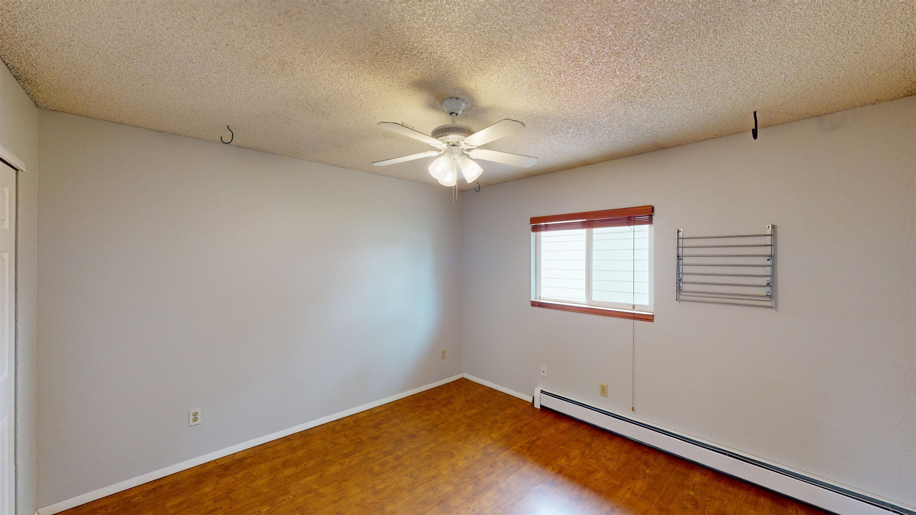 449 Doris Road Grand Junction, CO 81504 - Photo 20 of 35 an empty room with windows and fan